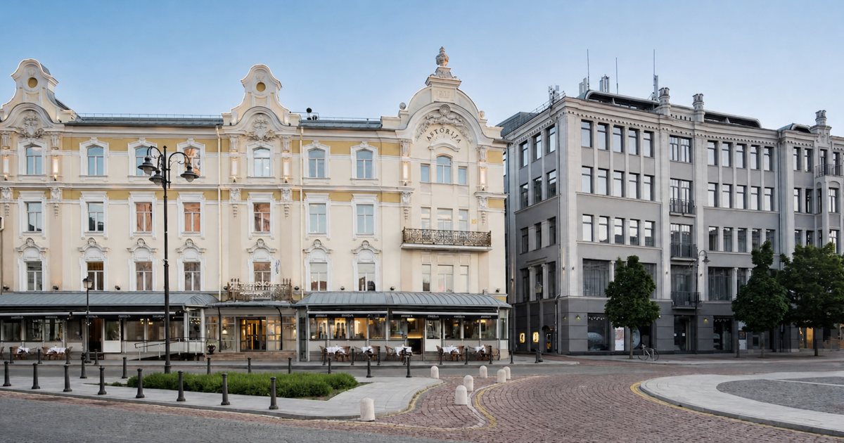 Historic hotel buildings beside a quiet square in central Vilnius